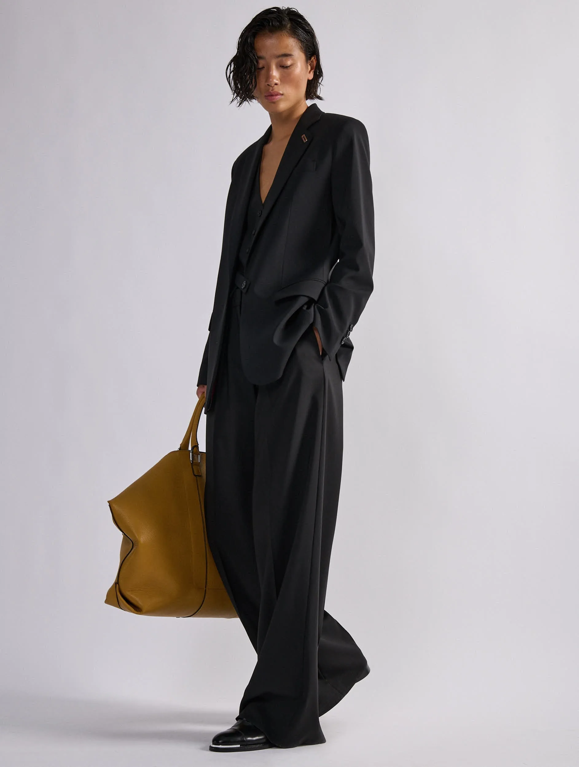 Straight jacket in black woollen canvas