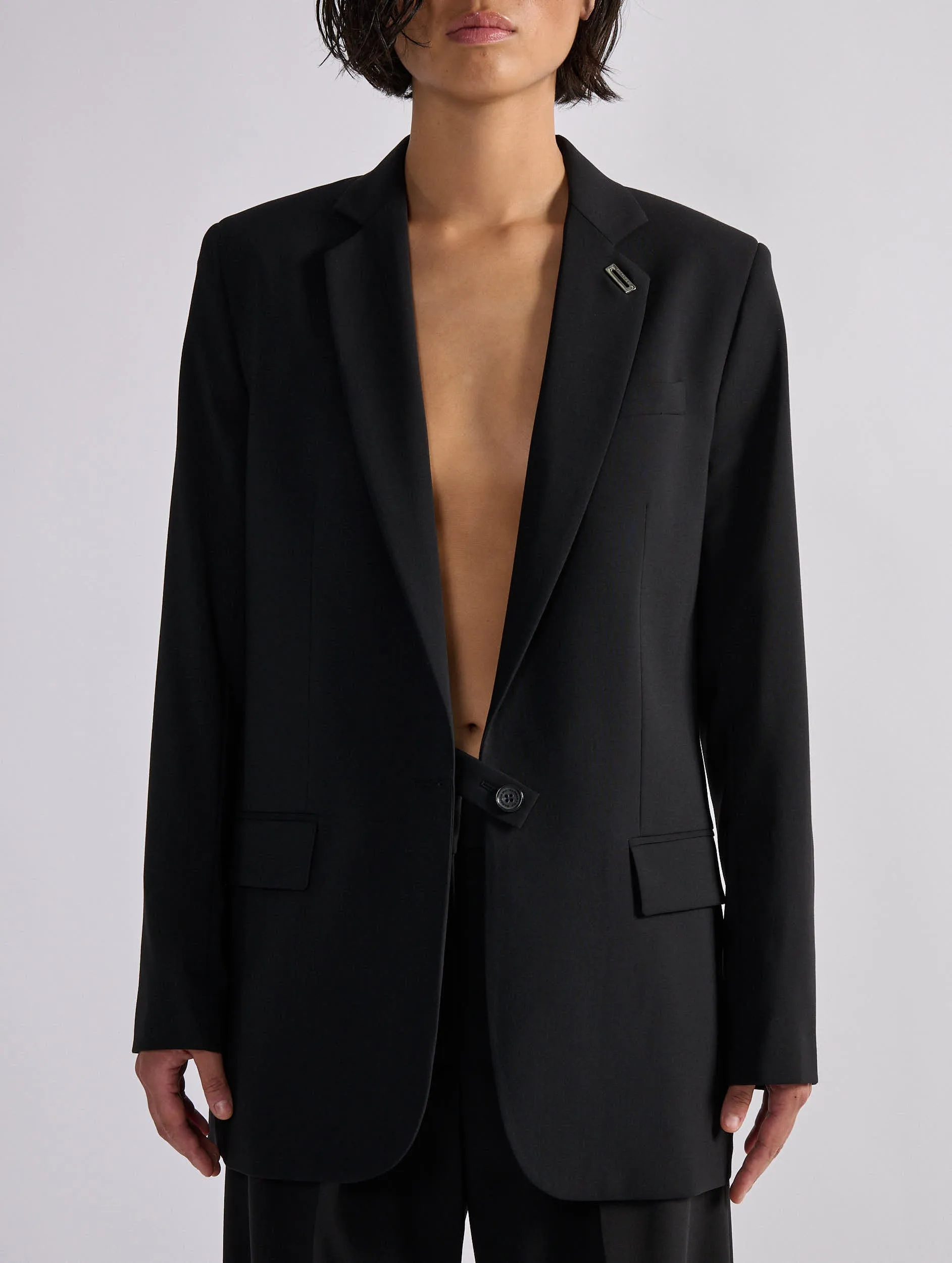 Straight jacket in black woollen canvas