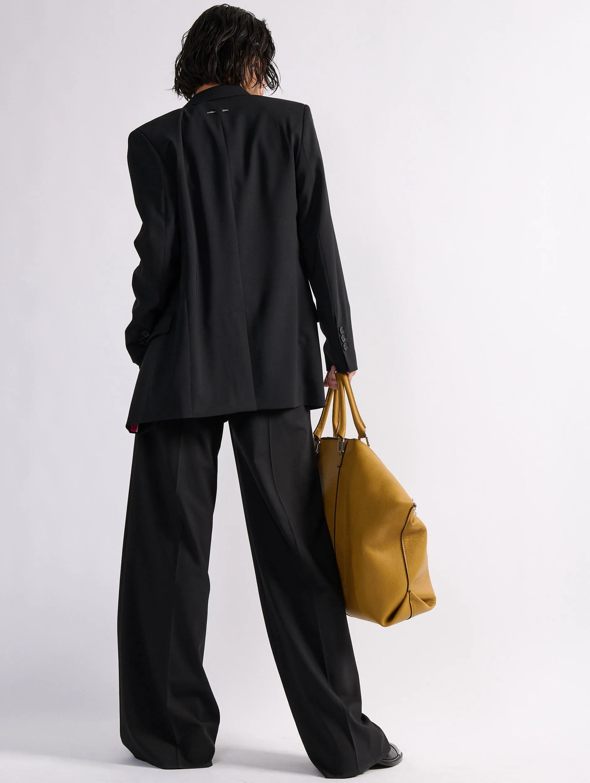 Straight jacket in black woollen canvas