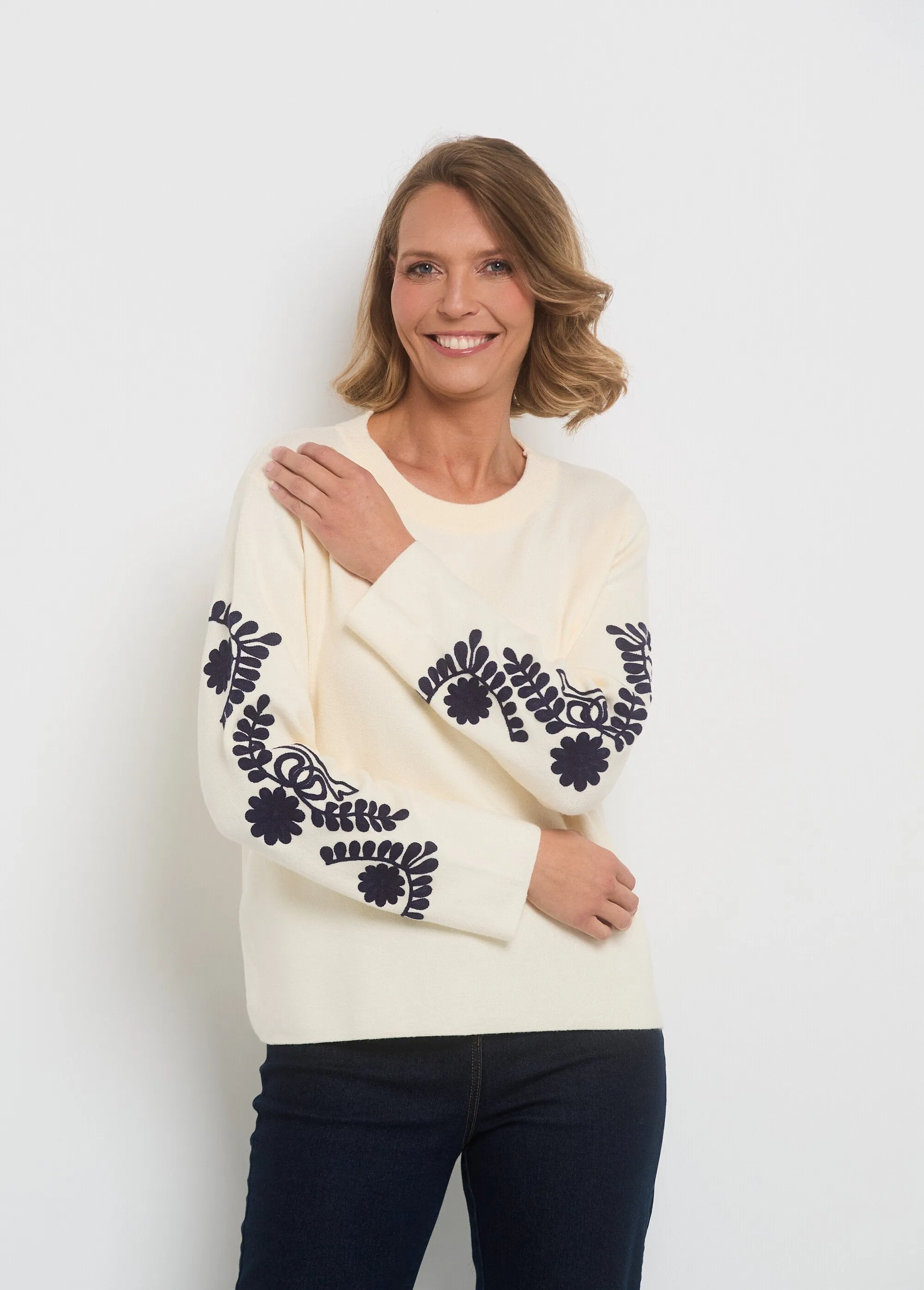 Sweater sleeves with fancy embroidery