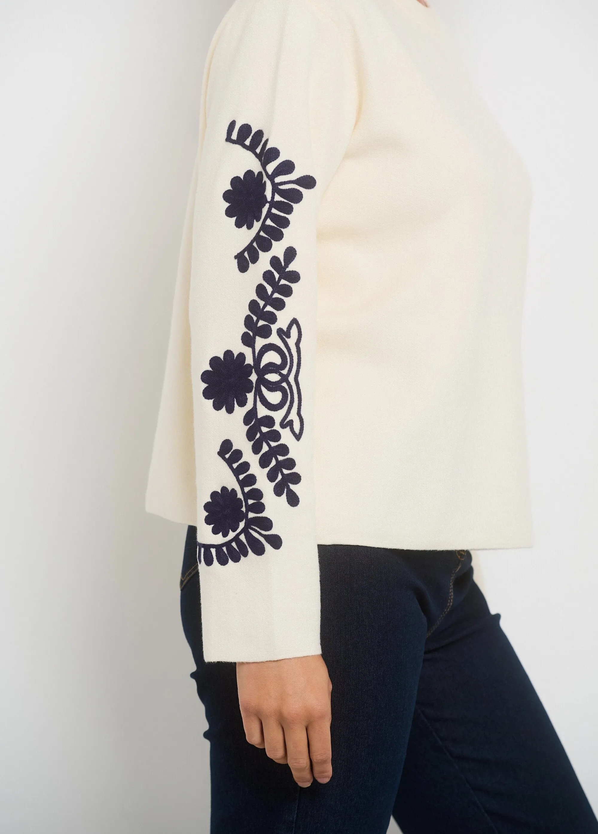 Sweater sleeves with fancy embroidery