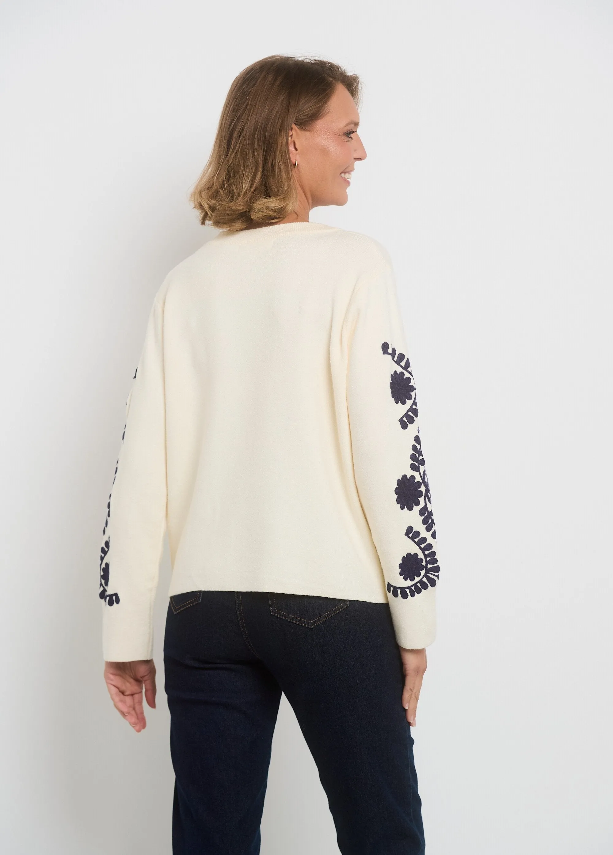 Sweater sleeves with fancy embroidery